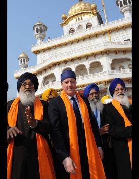 Prime Minister David Cameron on his visit to Amritsar's Golden Temple where he laid a wreath where Indians were killed by British colonial forces in 1919