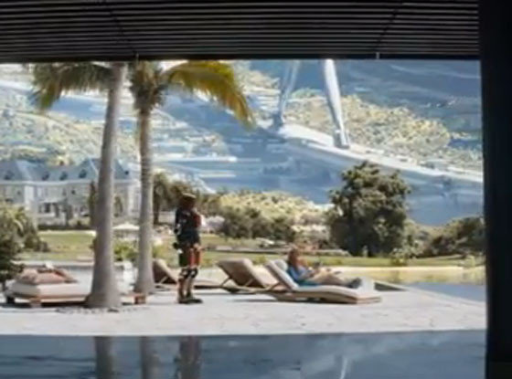 Life in Elysium: Poolside with a robot waiter.